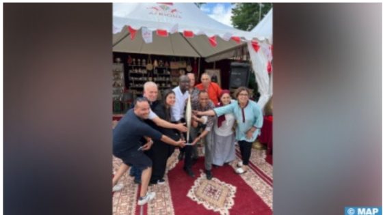 Olympic Torch Makes Stopover at Moroccan Stand in ‘Africa Station’ Fan Zone